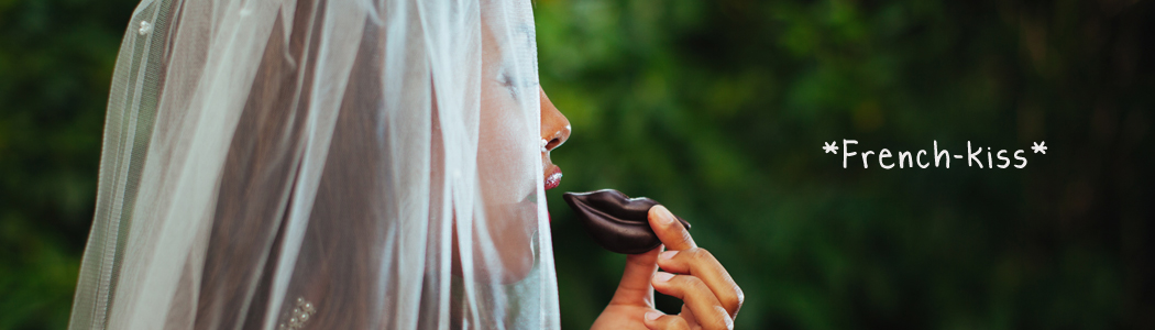 French kiss praline made of strawberry ganache in the shape of a mouth